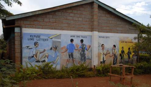 Educational advice on a building's wall of St. Stephen's Children's Home in Embu.