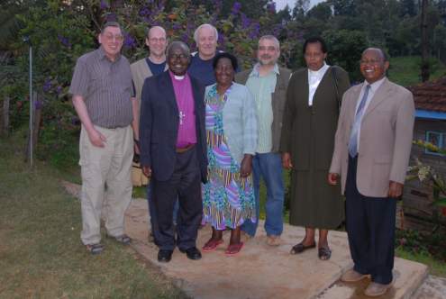 These society members visited Rtd. Bishop Moses Njue (center) in the Kenyan highlands.