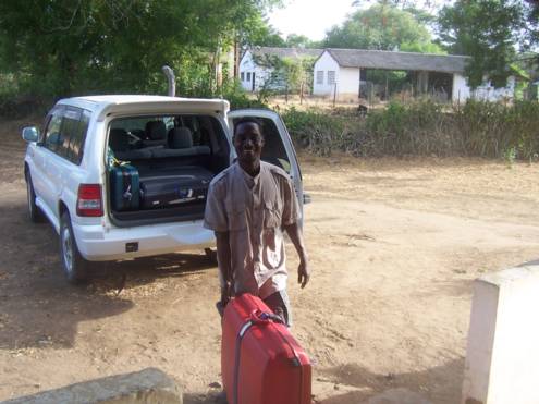 Our driver while unloading our baggage in Wema.