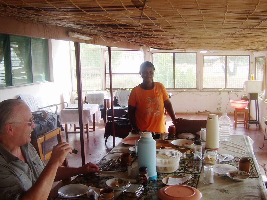 Talk with the housekeeper while having lunch in the Catholic Mission, Wema.