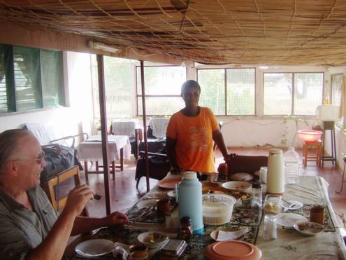 Talk with the housekeeper while having lunch in the Catholic Mission, Wema.