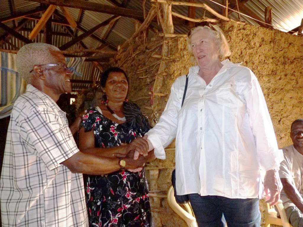 Meeting with a pastor and his wife who are cooperating with our society. On the right: society member.