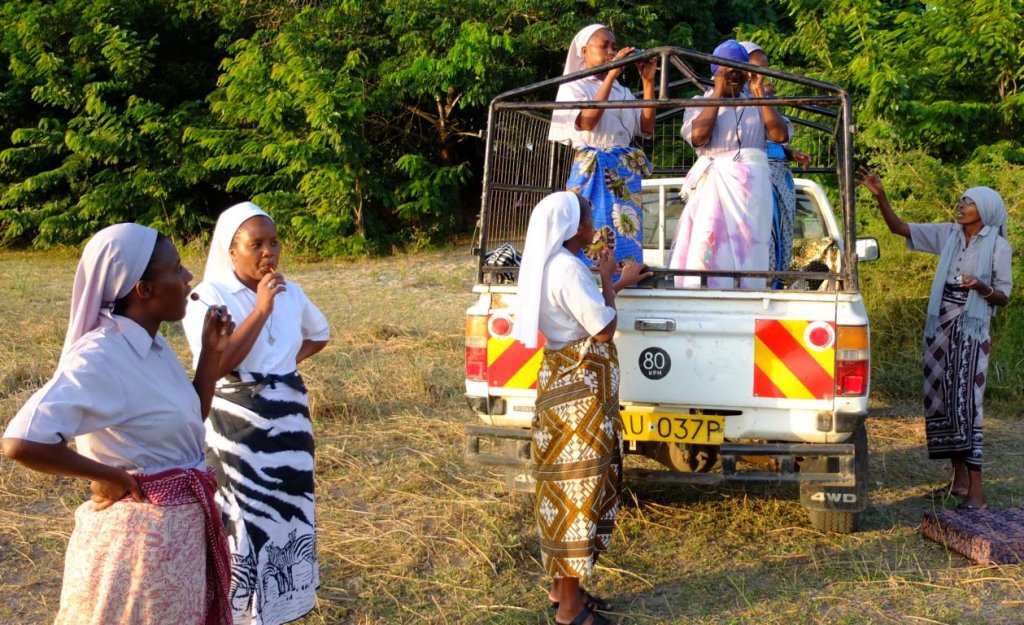 At the shores of Lake Kenyatta, we took a break with the Sisters.